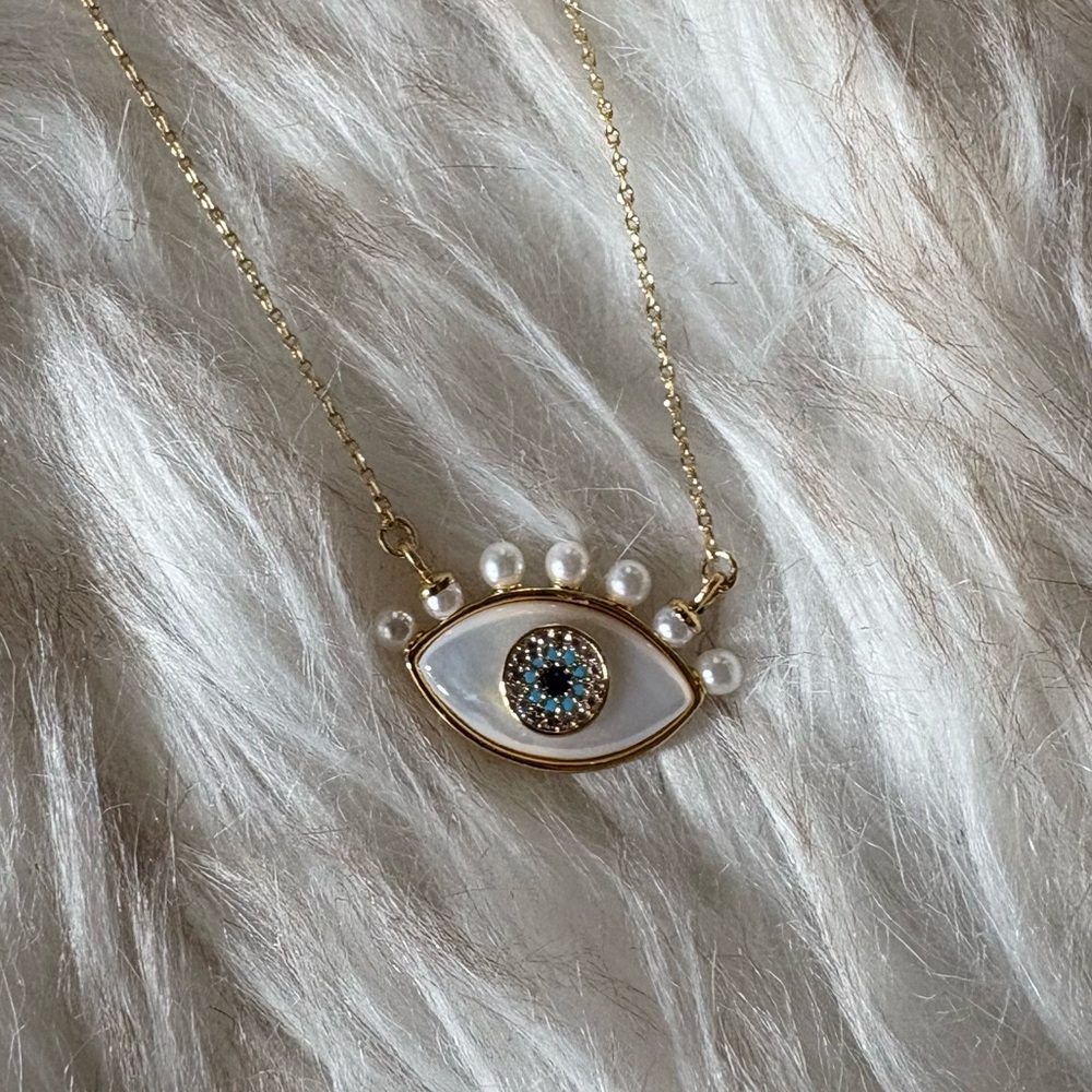 Kate Spade Gold Eye Pendant Necklace with Pearl and Crystal Details